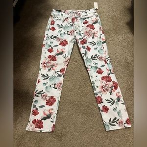 Cropped white and floral print skinny jeans with side slits